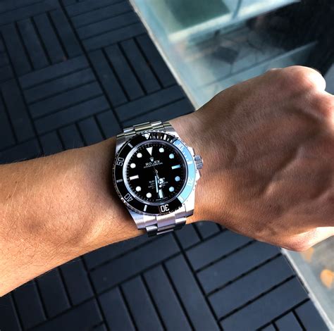 rolex submariner wrist.